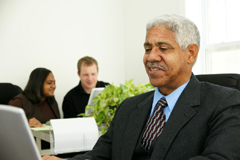 Man with a laptop in an office